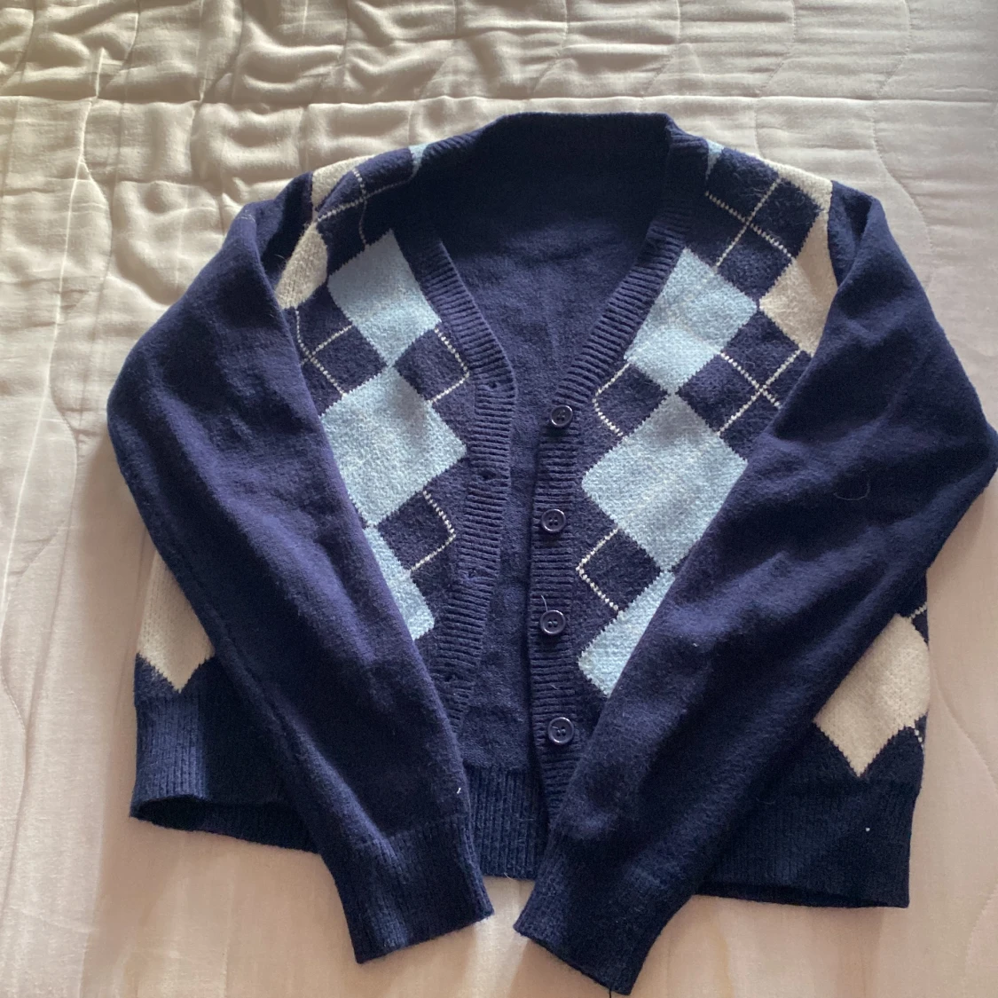 Stickad rutig kofta