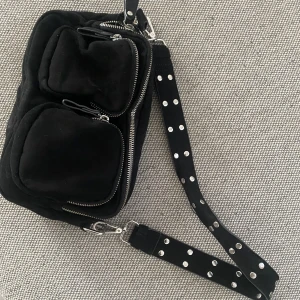 Väska - En fin väska som tyvärr inte komme till någon användning längre. 