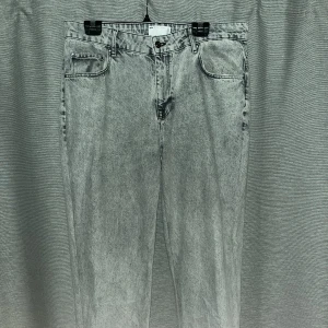 Baggy ljusgrå jeans från asos - Fina baggy jeans 