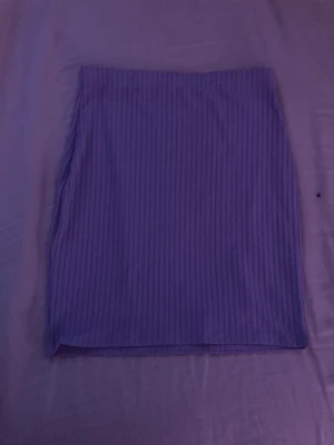 Kjol - Lila kjol storlek 36