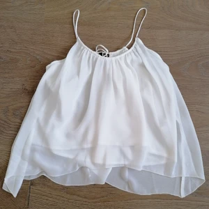 New Charlotte Eskildsen Monica top XS - New Charlotte Eskildsen Monica top.  Size 34.  Polyester, lining 100% cotton.