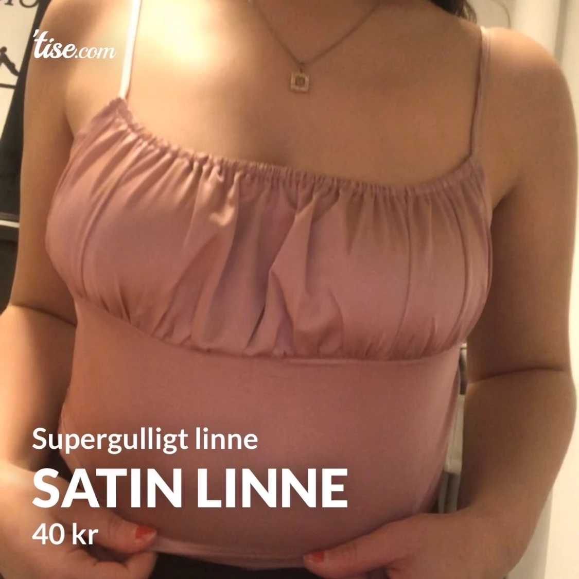 Ljusrosa satin linne