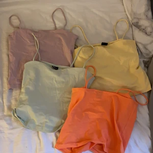 Fyra stycken linnen från Gina Tricot - Fyra stycken färgglada linnen från Gina Tricot, köpte dessa för 150kr styck men säljer den för 50kr styck. Om man vill ha alla kostar de 150 inklusive frakt🥰