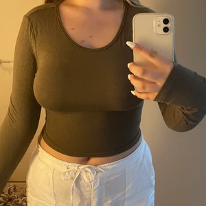 Grön crop top - Grön Croptop med knytning i ryggen