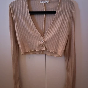 Topp från Nelly - Storlek L, oanvänd 