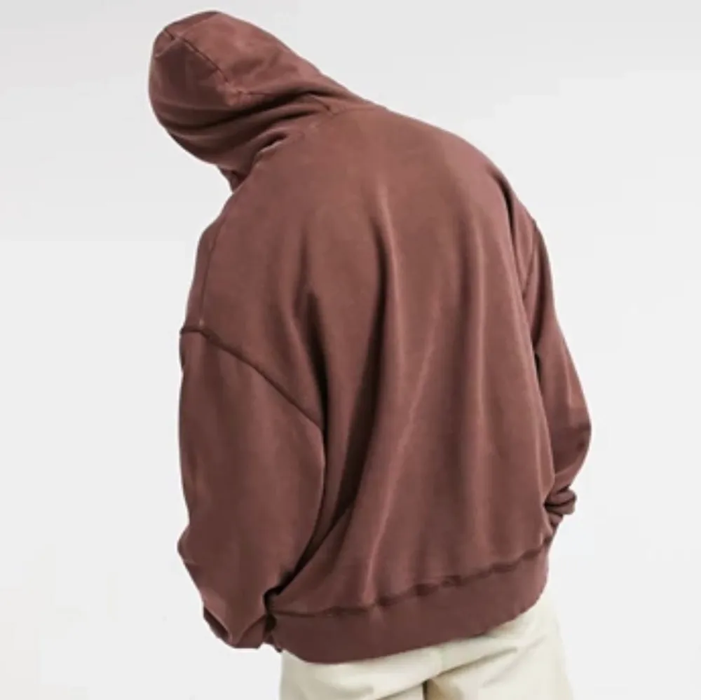 Excellent used condition Collusion ASOS Brown Oversized Hoodie. COLLUSION oversized hoodie with contrast seam detail in brown garment dye. I get Yeezy aesthetic from this hoodie! Tagged size Medium. Unisex, oversized fit. Drawstring hood. Overhead design. Dropped shoulders. Ribbed trims. The hoodie is pre-distressed and over dyed so please allow variations of distressing. No discolouration/stains & rips/tears/holes that weren’t supposed to be there or deliberate. Smoke and pet free storage space. No other flaws to note. Happy to bundle. Will gladly take more pics. Disclaimer: Please expect some general wear in all secondhand pre-owned items as they have lived a previous life, so do not expect a mint item. **TRACKED SHIPPING VIA POSTNORD**. Hoodies.