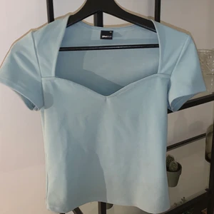 Topp - Turkos topp från ginatricot 