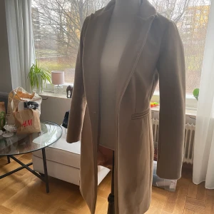 Kappa  - En fin kappa knappt använd