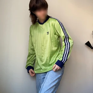 Adidas long sleeved, green - I love this shirt! It’s comfortable but the material is a little silky so if that’s not your thing then this is not the shirt for you. It has a bit of a v-neck shape and is a little over sized on me but I don’t mind that! It has a little tissue damage that isn’t really notizable unless you get REALLY close, if you need more pictures HMU! I’m getting rid of it since it isn’t really my style anymore so I hope it can’t find a home elsewhere! 