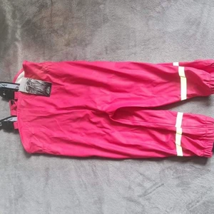 Regnbyxor barn strl 92  - Ett par oanvända regnbyxor i strl 92