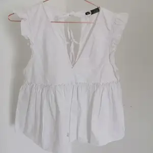 ZARA white shirt, cotton. Worn a couple of times. Easy iron. Cute details on the back.