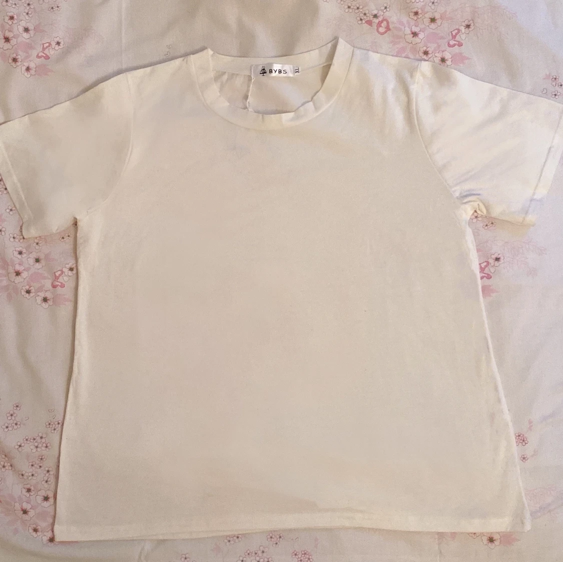 Enkel vit kortärmat topp