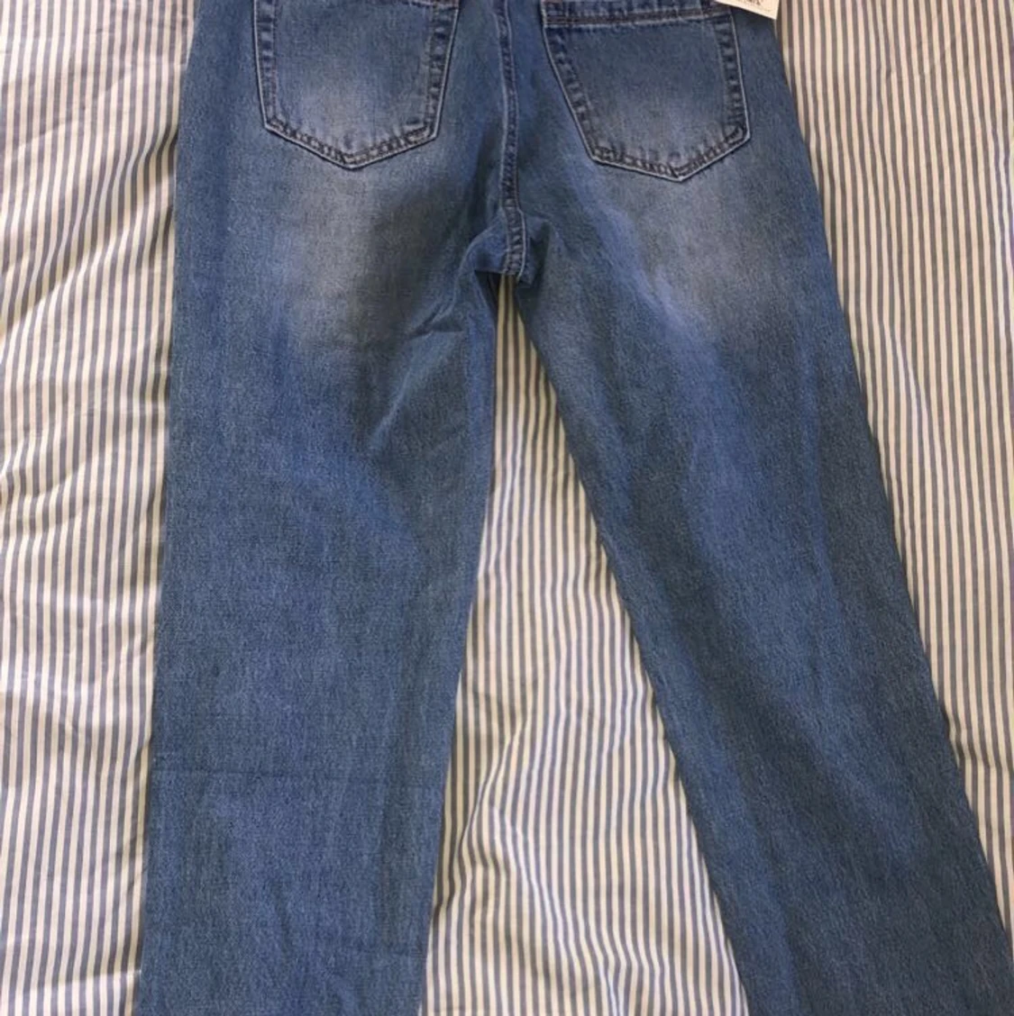 Högmidjade slitna jeans - 90