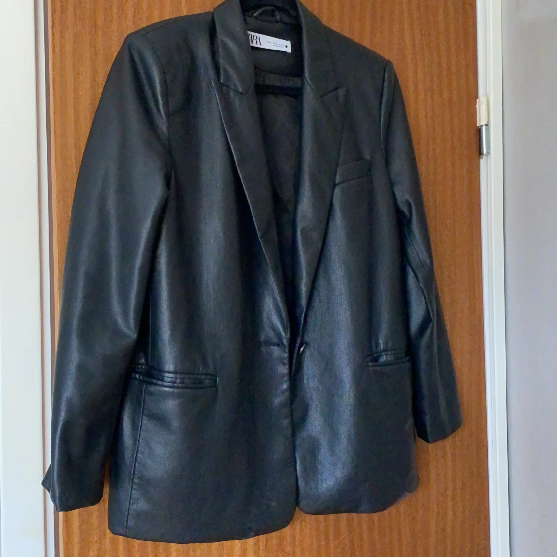 Kavaj i skinnimitation 