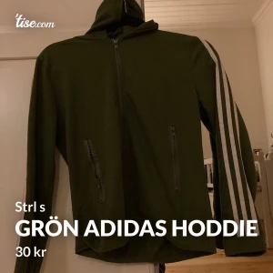 Grön adidas hoddie med dragkedja. - Säljer denna tröja för den är lite liten.