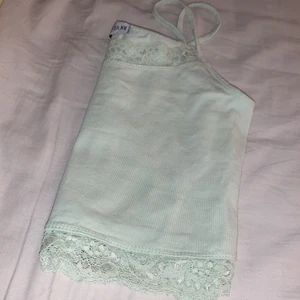 Linne med spets storlek XS!  - Mintgrönt linne från New Yorker i storlek XS! Aldrig använd, bra skick 