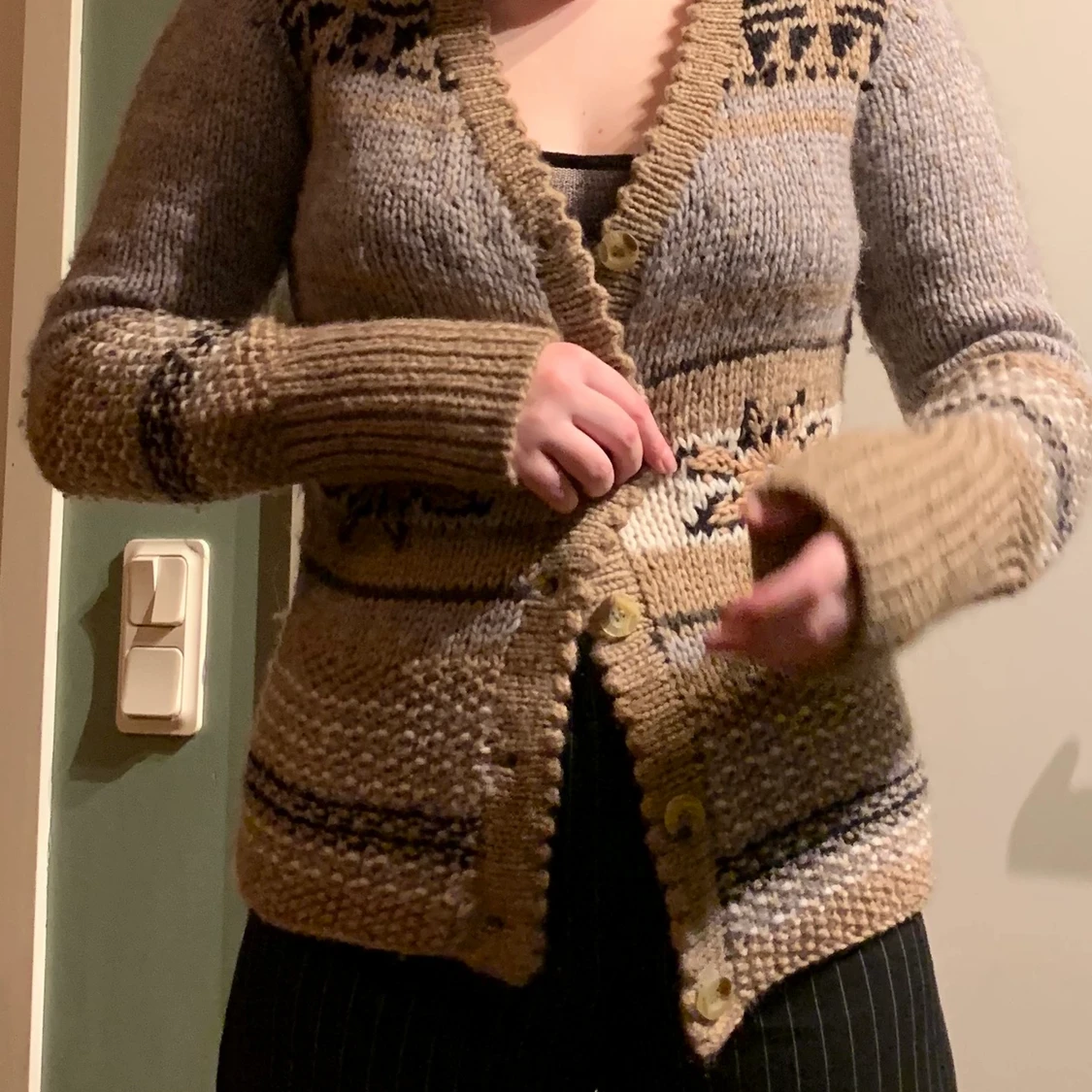 En stickad varm kofta - 91