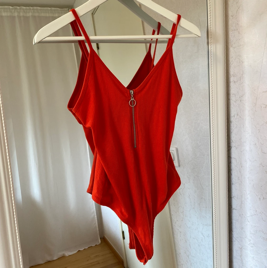 Orange/röd body storlek S - 90