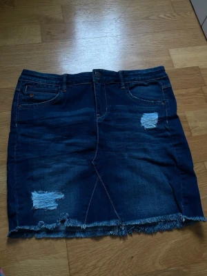 Jeans skirt - Low rise jeans skirt  Thigh length  Size 34-36 