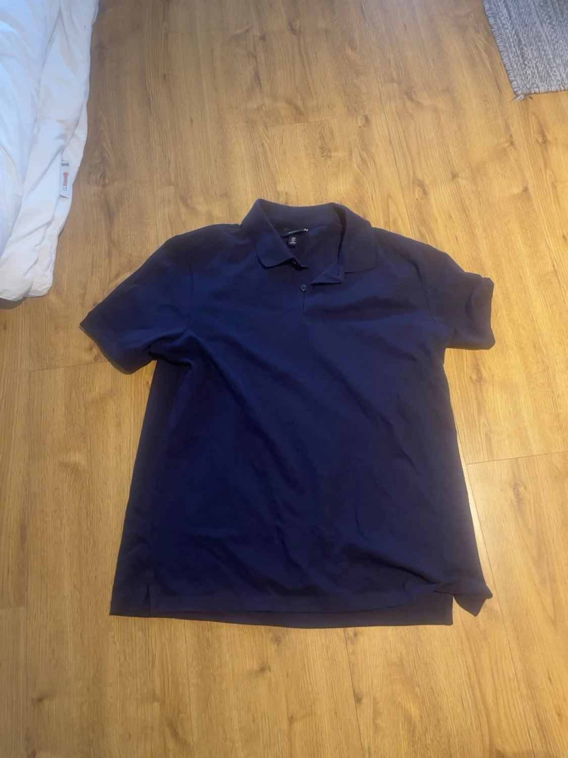 Marinblå pikétröja från H&M