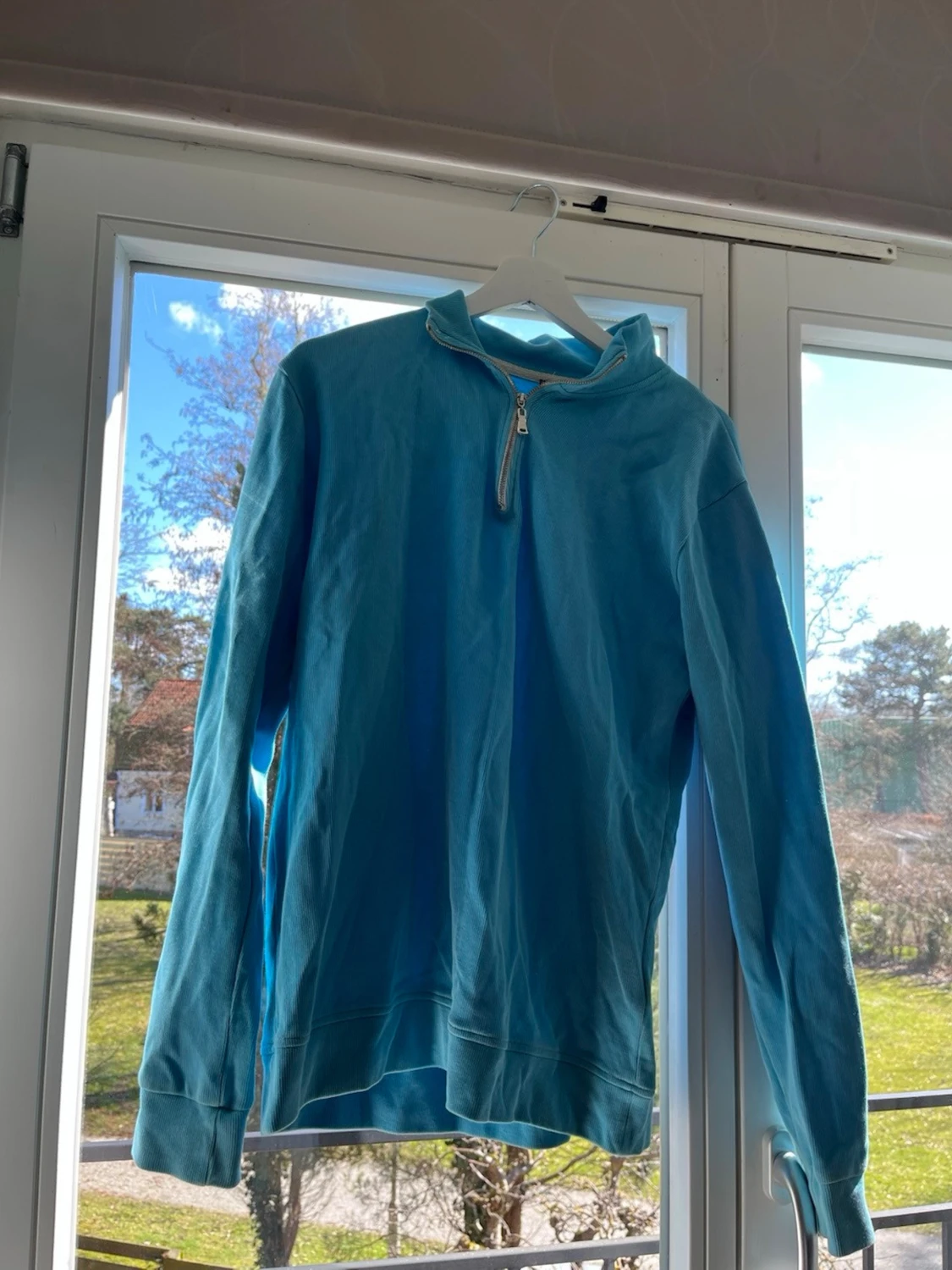 Blå halvzip tröja