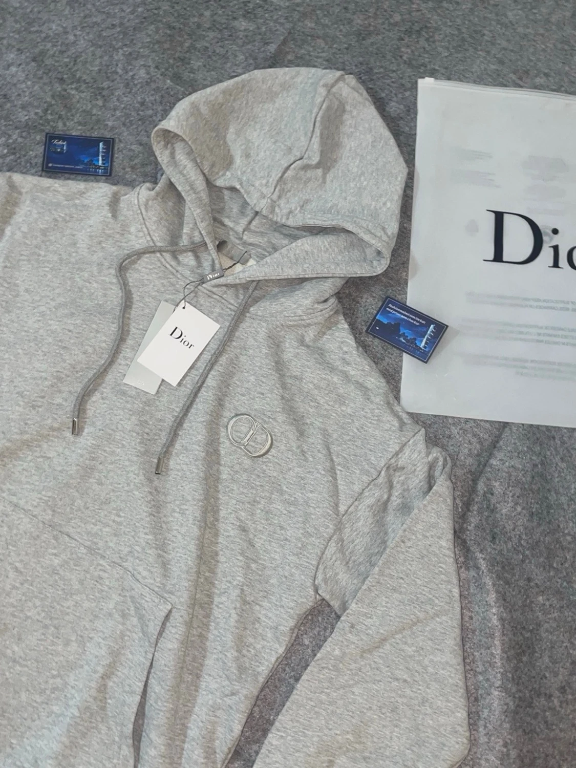 Grå hoodie från Dior med logga - 1