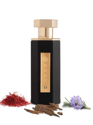 Reef 33 exklusiv parfym - Lyxig parfym från Reef med elegant svart och guld flaska. Doften har orientaliska inslag med noter av saffran, oud och blommor. Flaskan har en modern, kantig design med gulddetaljer och levereras i en snygg svart förpackning med rosor i relief.