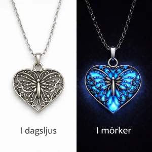 Halsband med lysande hjärthänge - Unikt halsband med ett hjärtformat hänge i silverfärgad metall. Hänget har ett detaljerat fjärilsmotiv och lyser i blått i mörker, vilket ger en cool och magisk effekt. Perfekt för dig som gillar smycken som sticker ut och har en personlig touch. 🌸✍️🏻// Handgjord & skapad av mig, tillverkat med högkvalitativt självlysande pigment för ett tydligt sken och lång livslängd. Kedjan och hänget tål vatten och missfärgas inte.
