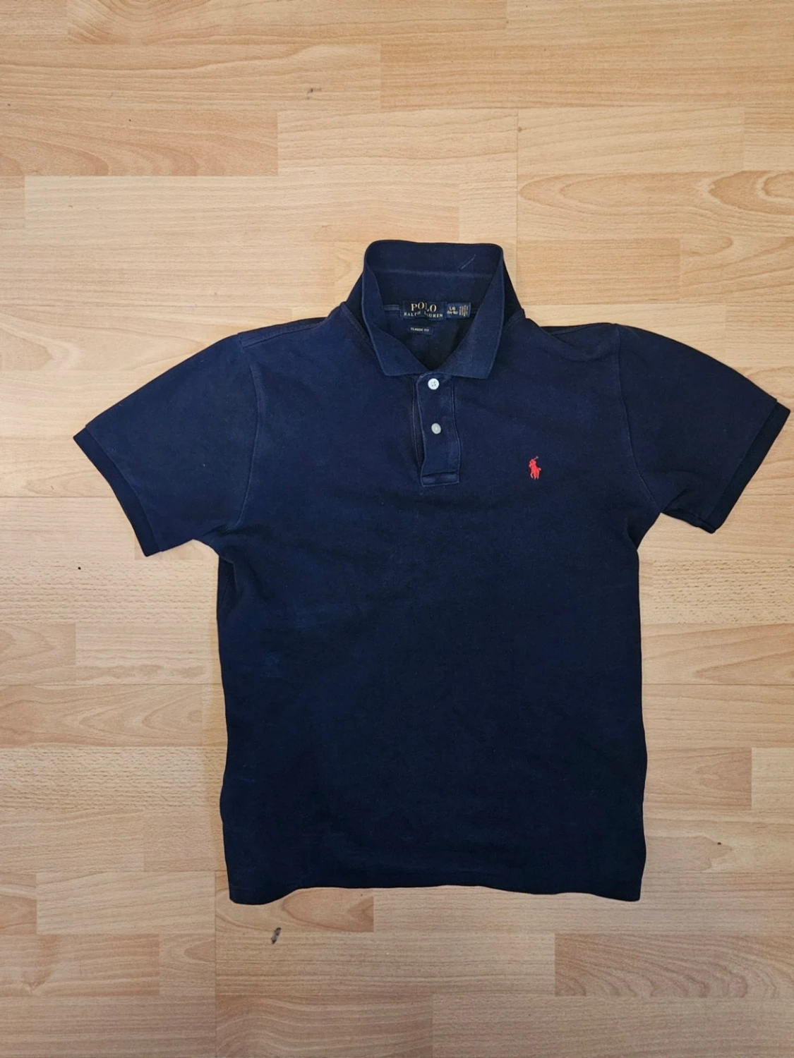 Marinblå pikétröja från Ralph Lauren