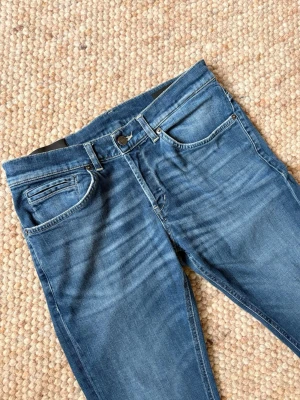 Dondup George jeans - Säljer dessa feta Dondup George jeansen👌Storlek=W31, Skick:9,5/10⭐️. Vid frågor eller funderingar är det bara att höra av sig👍