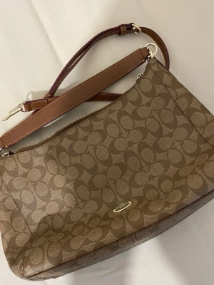 Coach bag/ väska  - A classic and timeless brown Coach bag with no signs of use, in good condition. Shipping available (usually within 1 day) and local pickup is also possible. Price can be discussed. 