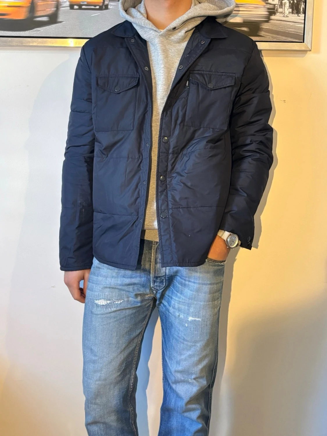 Mörkblå dunjacka med tryckknappar