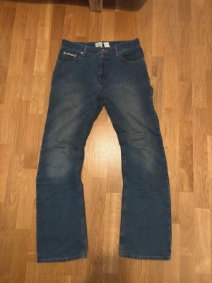 Vintage Calvin Klein  Bootcut Jeans - Vintage low waist bootcut jeans.  Brand: Calvin Klein Tagged size: W30  Waist (flat): 40cm Length (inseam): 107cm Leg opening: 21,5cm  More jeans available on my profile.  