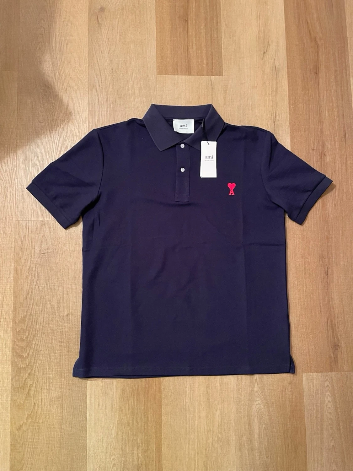 Mörkblå piké från Ami Paris