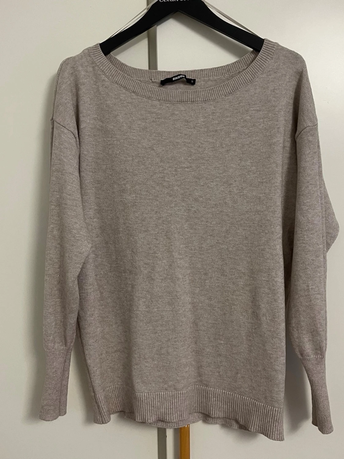 Beige stickad tröja från BikBok