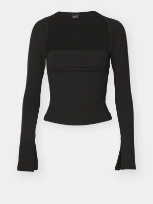 Svart långärmad topp från Gina tricot  - Snygg svart långärmad topp från Gina tricot med slim passform och minimalistisk design. Toppen har en croppad siluett och är tillverkad i mjukt syntetmaterial som sitter bekvämt. 