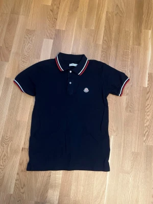 Polo shirt - Size: Big in size. Colour: Navyblue