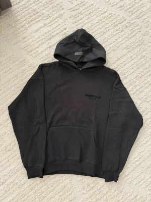Essentials black hoodie - Size M, true to size. Unused, brand new and fresh. Please feel free to ask questions.