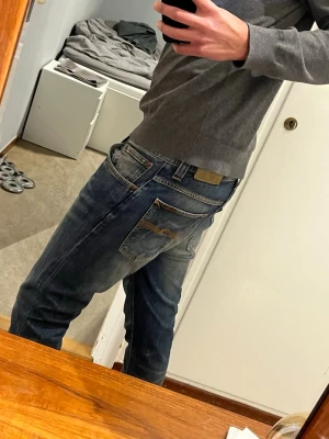 Grim Tim Nudie Jeans (Fri Frakt) - Använd ett par gånger, utan defekter. Storlek W31 L34. Fraktas inom 24h 📦💨❤️                     (Samma annons som den andra på min profil fast med fri frakt)