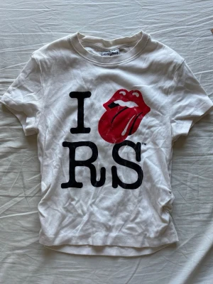 Vit Rolling Stones t-shirt - Vit t-shirt med snyggt tyck 