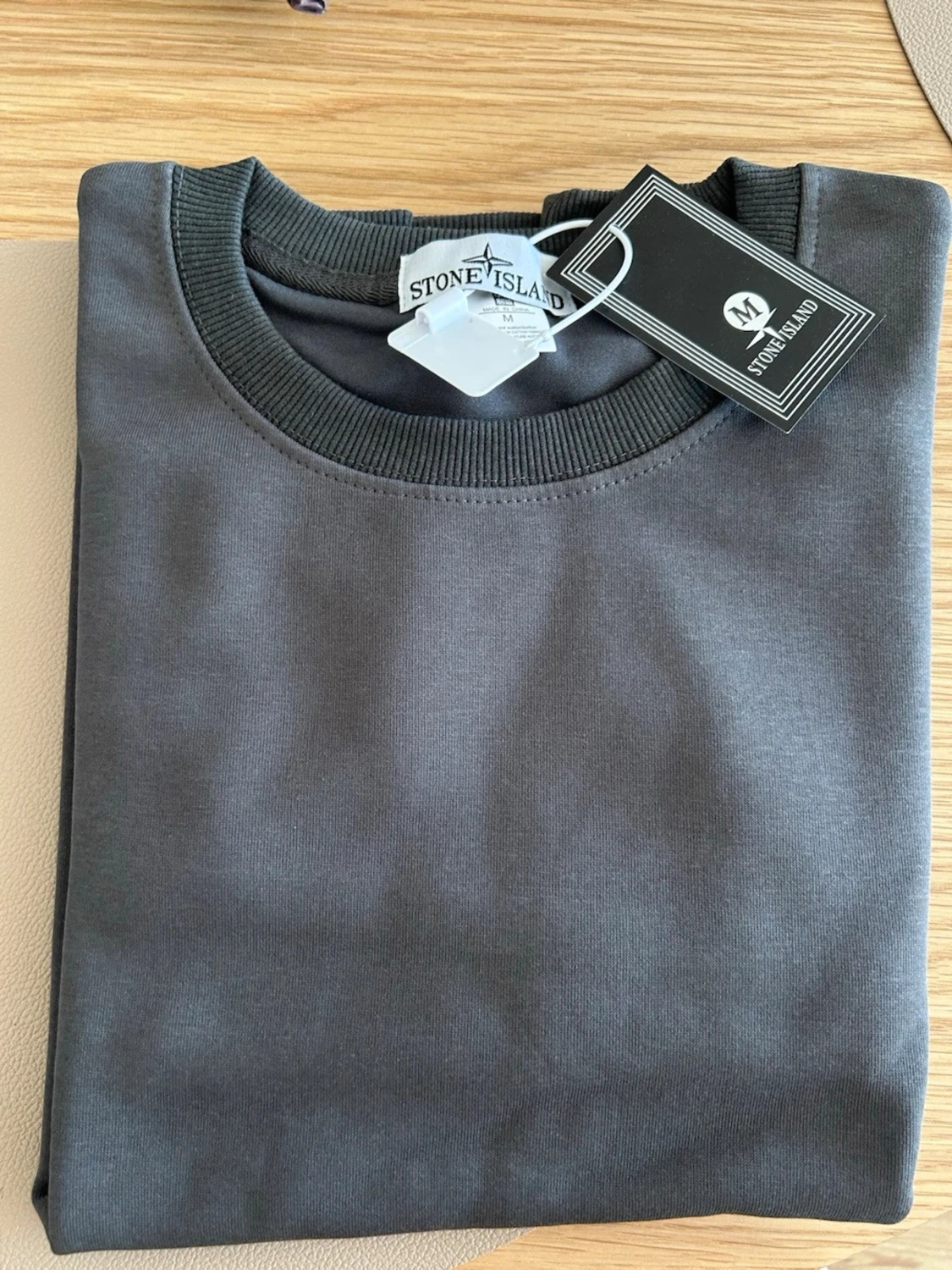 Mörkgrå sweatshirt från Stone Island