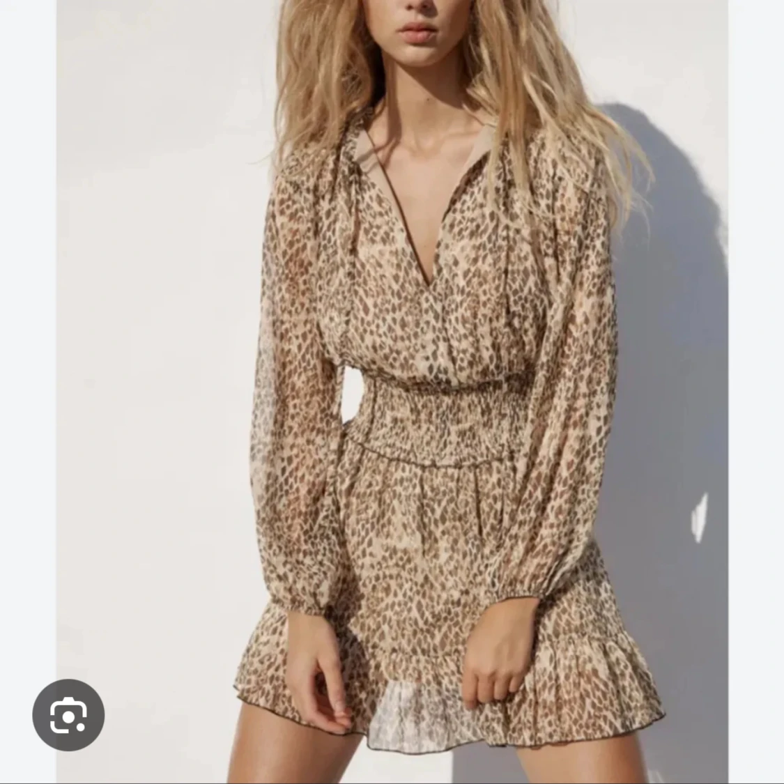 leopardmönstrad klänning