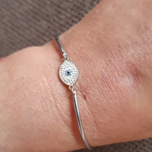 Armband  - Armband med skydd mot onda ögat, nazar evileye Öga i kristaller, armband i stainless steel, nickelfritt  Nyskick  100kr
