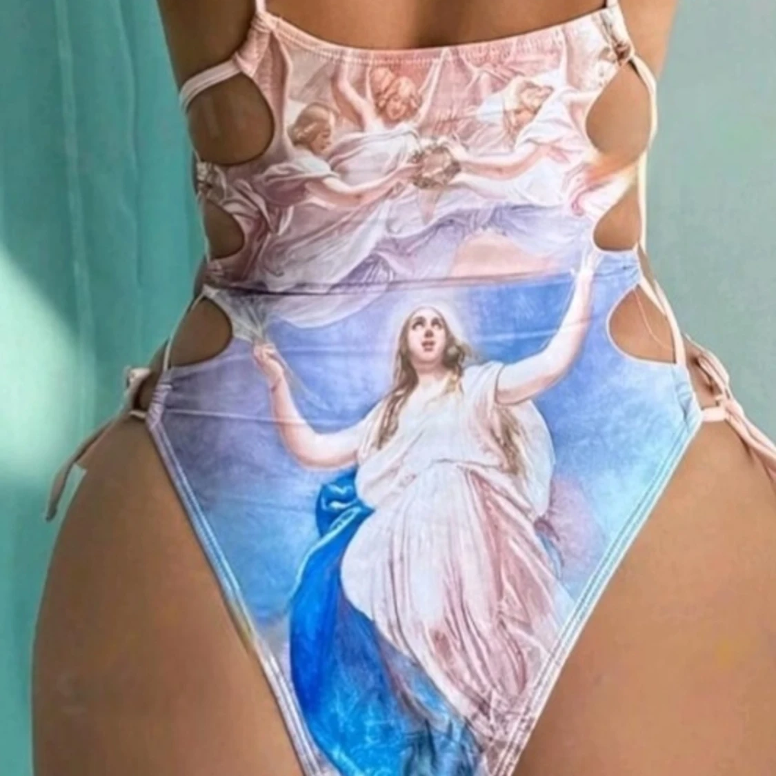 HELT NY & OANVÄND ovanlig baddräkt, pastellfärgad / flerfärgad. Änglar. Strlk: LITEN Large. - 2