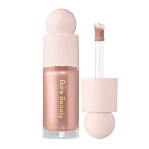 Rare Beauty Positive Light - Liquid Highlighter Mesmerize - Rare Beauty Positive Light - Liquid Highlighter i färgen ”Mesmerize” 15 ml. Köpt för några veckor sen men kan inte lämna tillbaka den. Endast testad. Väldigt fin färg! Orginal pris: 489kr. Kan mötas upp i Stockholm: T-Centralen.