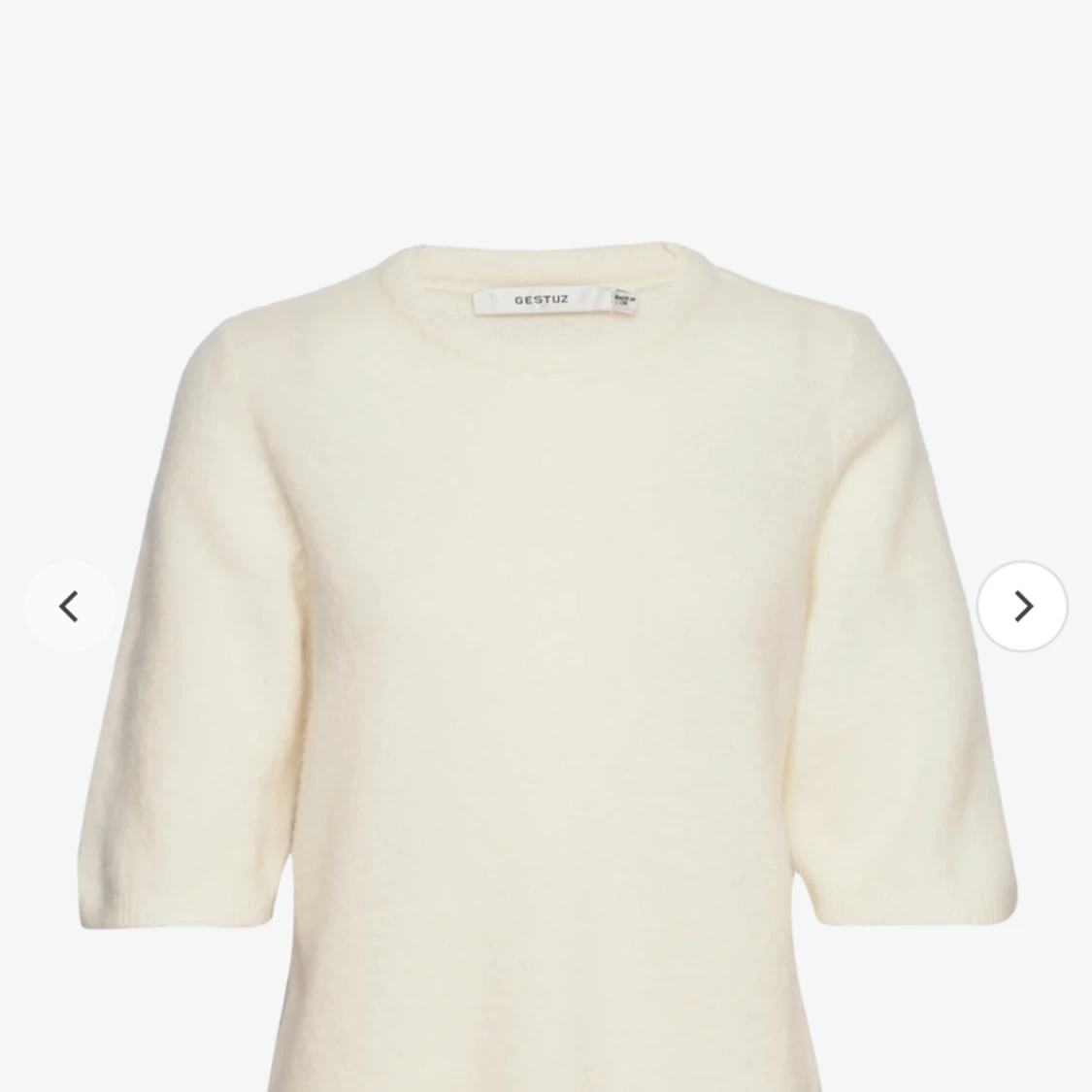 Stickad kortärmad tröja