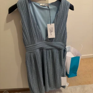 Ny kläning - Ny kläning med pris lap