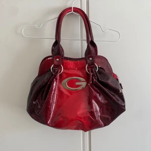 Vintage vinrödväska - Axelväska/handväska i läder. 