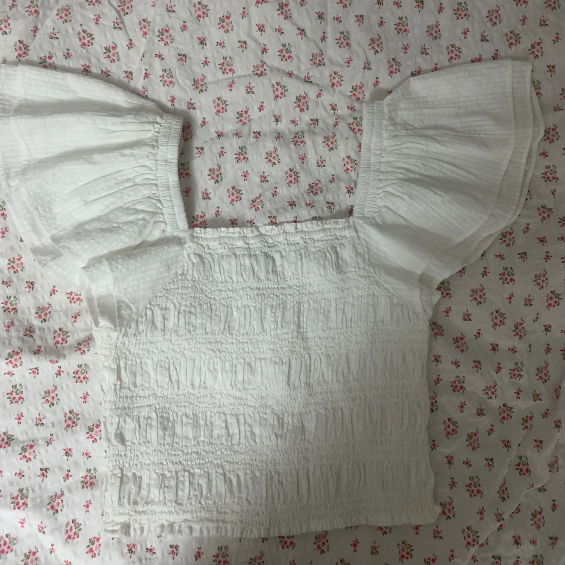 Blus med volangärmar - 93