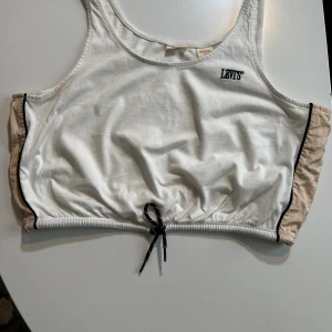 Top - Mini top which is suitable with jeans or any other teousers.